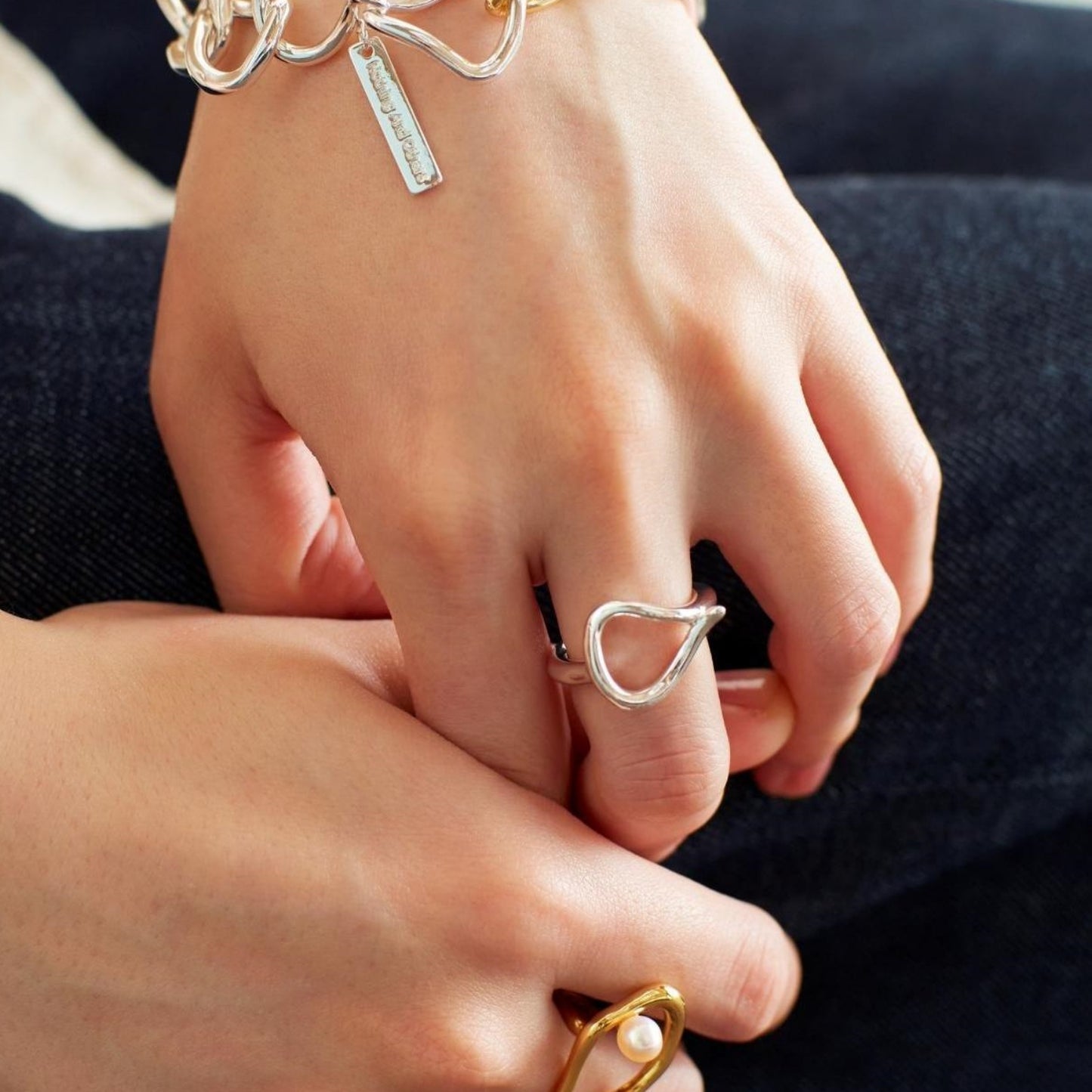 Hook motif Ring