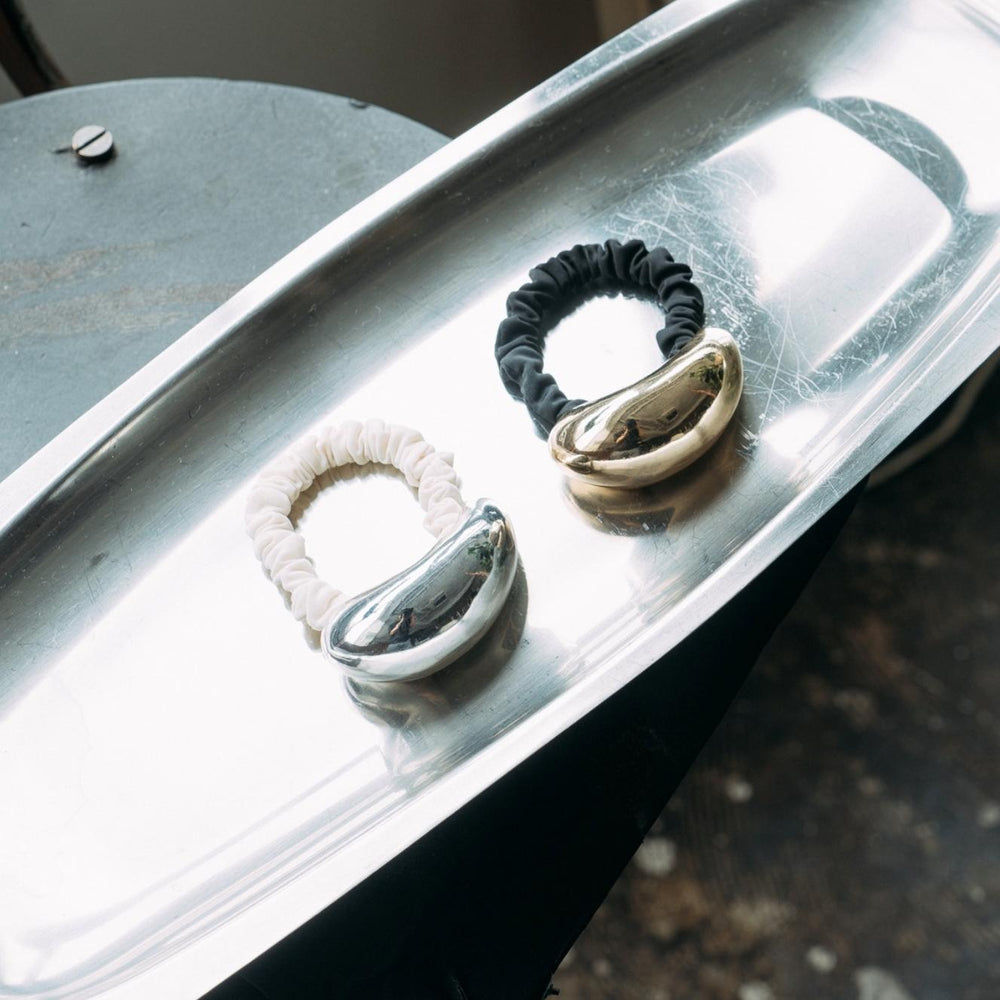 
                  
                    Metal Bean Hair Tie
                  
                