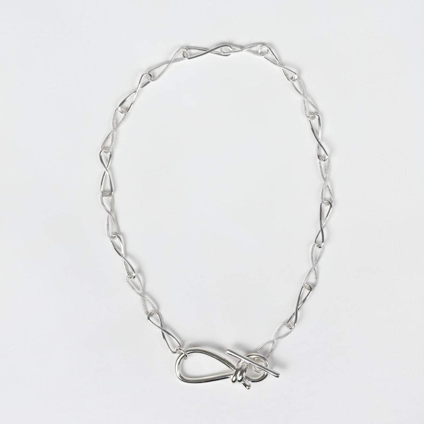 
                  
                    Knotting Chain Necklace
                  
                