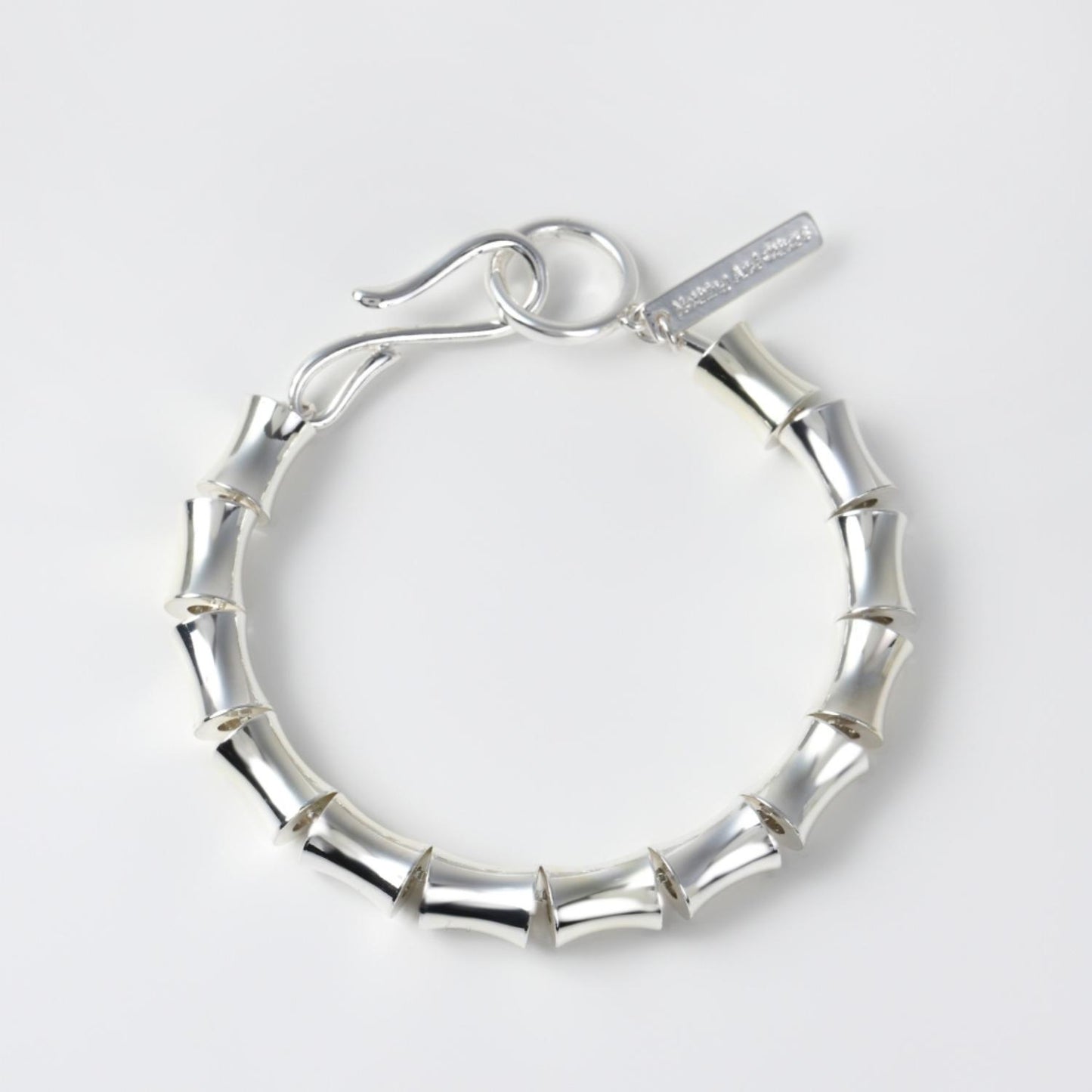 
                  
                    Warp Motif Bracelet
                  
                