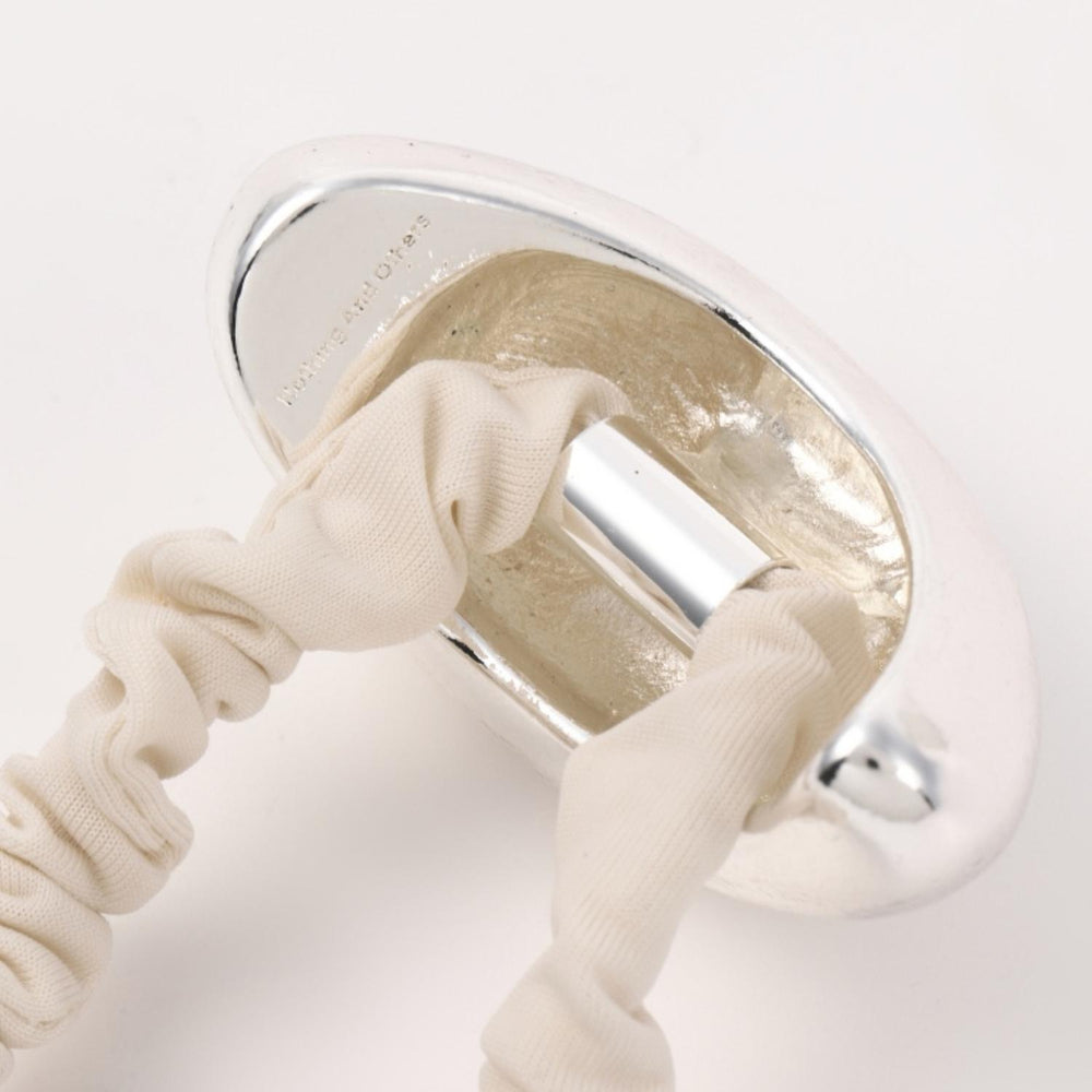 
                  
                    Metal Bean Hair Tie
                  
                