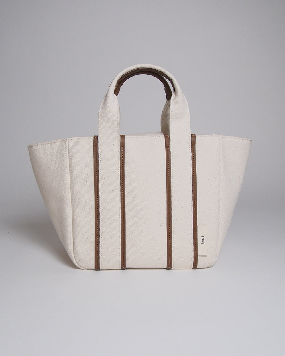 
                  
                    RECYCLED CANVAS line tote (S)
                  
                