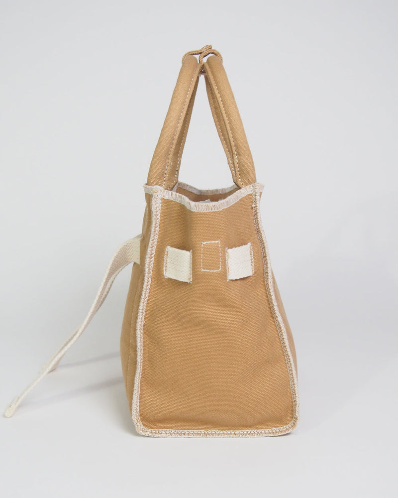 
                  
                    RECYCLED CANVAS belt tote (S)
                  
                